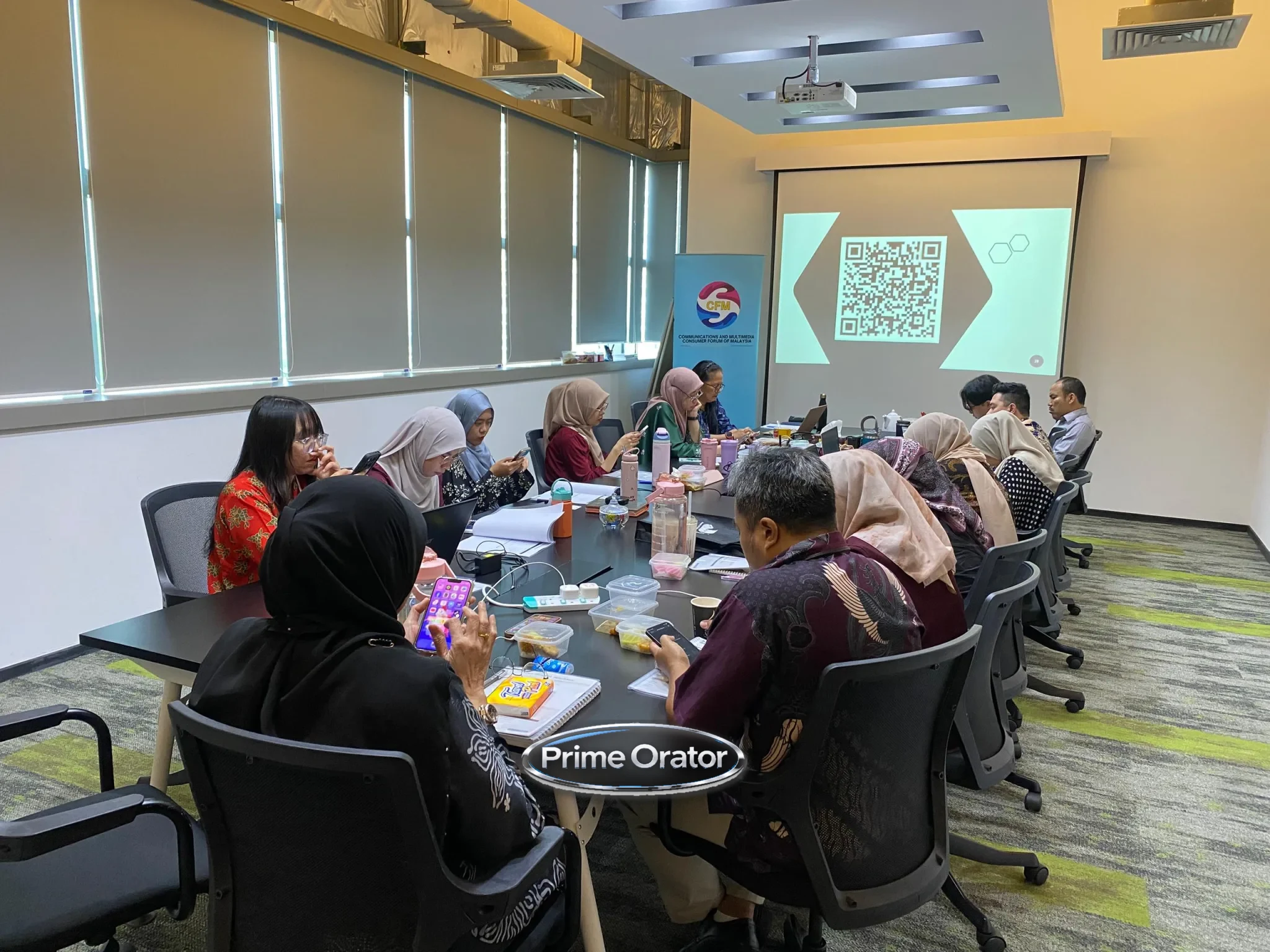 Malaysian corporate managers practising coaching conversations during a Prime Orator leadership workshop
